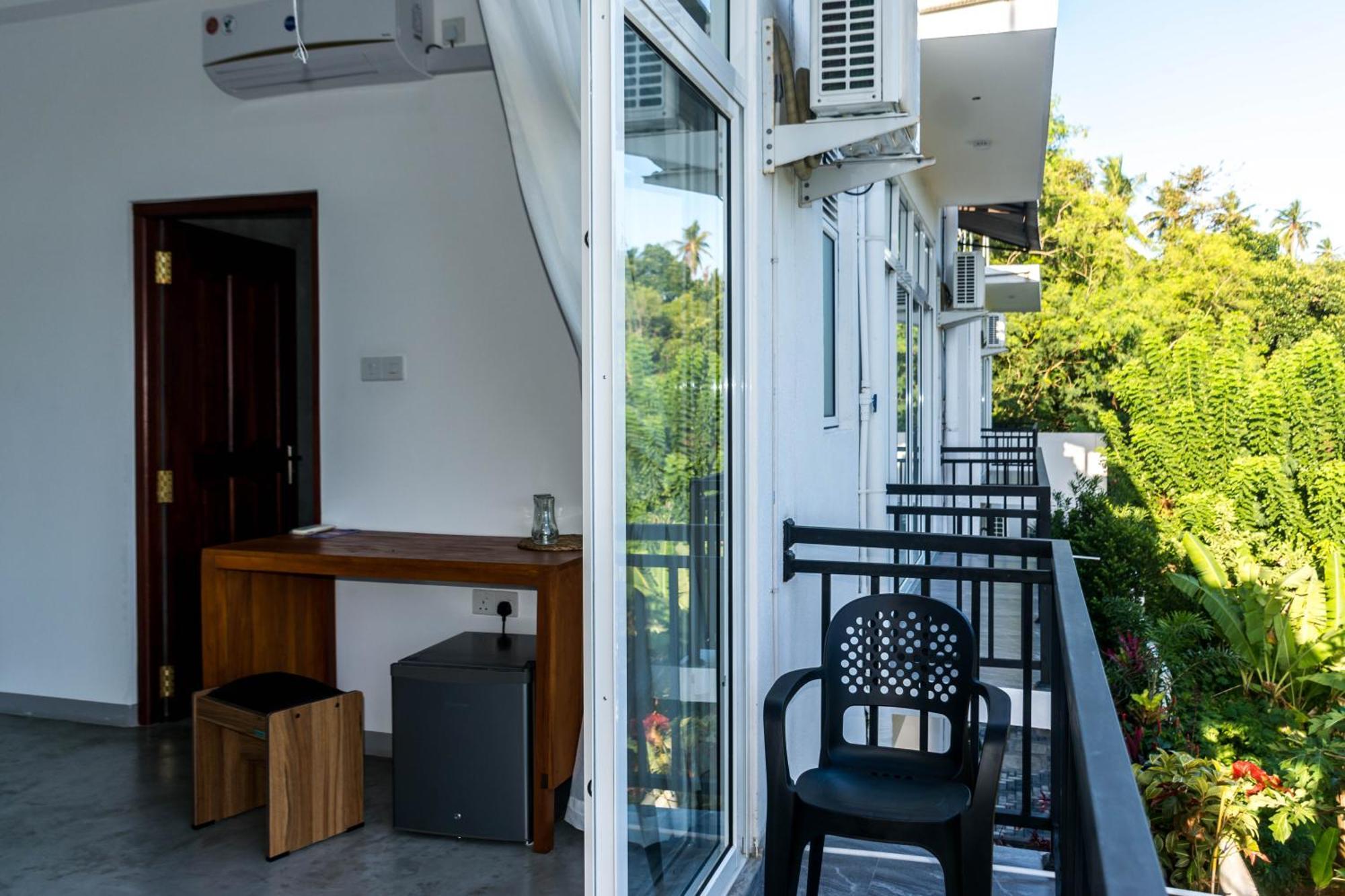 Zodiak Hotel Тангале Екстериор снимка